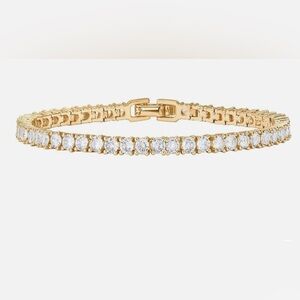 Women 14K Gold Plate Cubic Zirconia Classic Tennis Bracelet.
